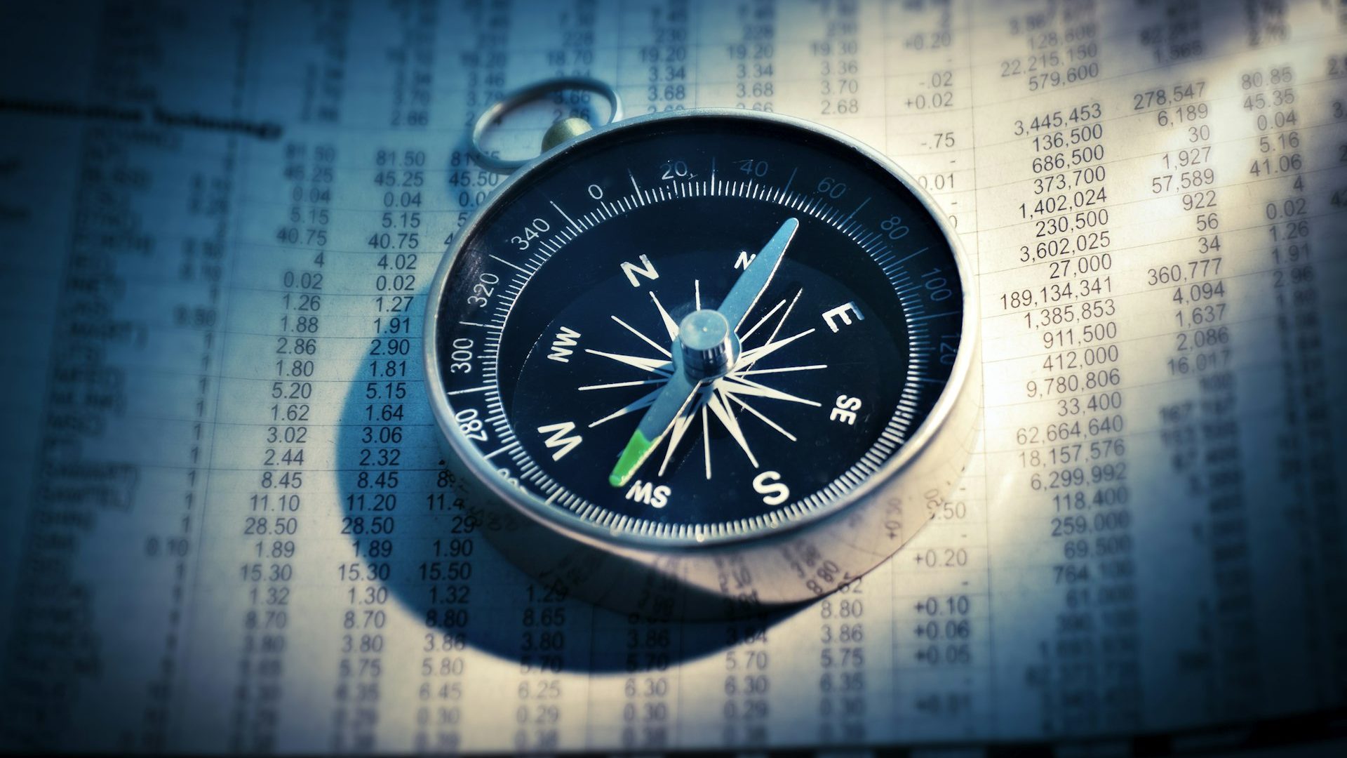 A compass resting on a surface
