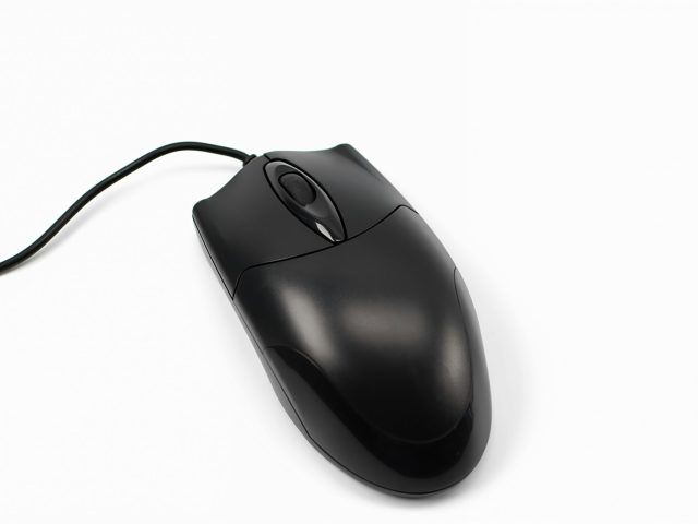 A black corded computer mouse