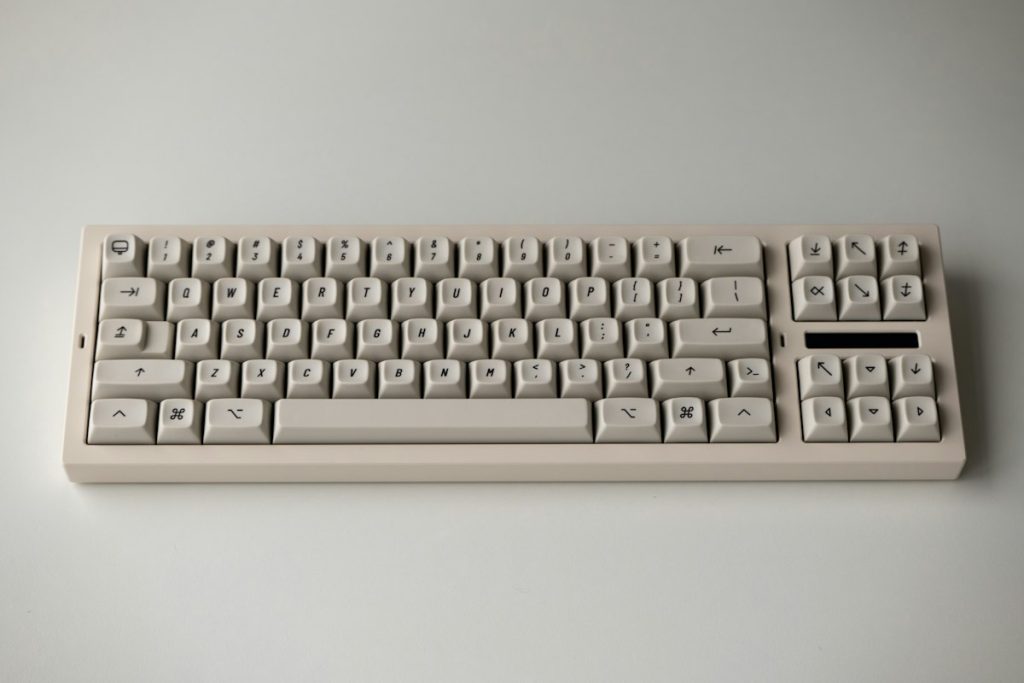 A worn beige computer keyboard