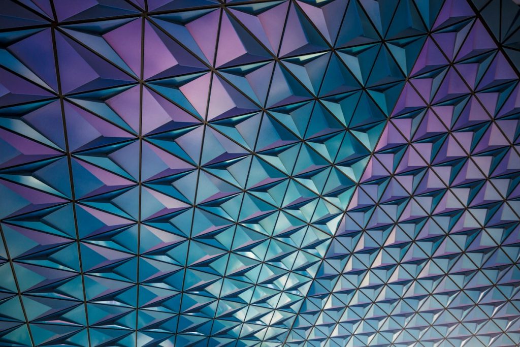 A symmetrical teal and pink pattern