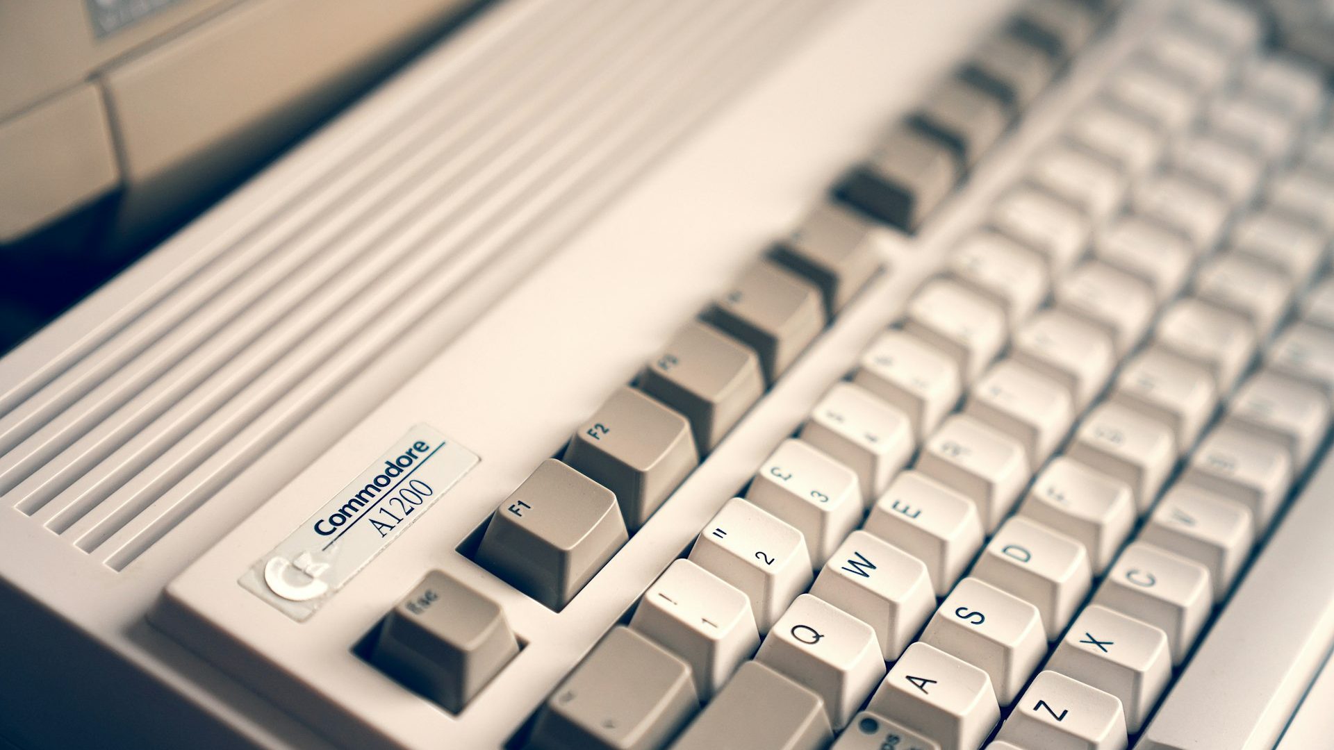 A keyboard with a small sticker on it