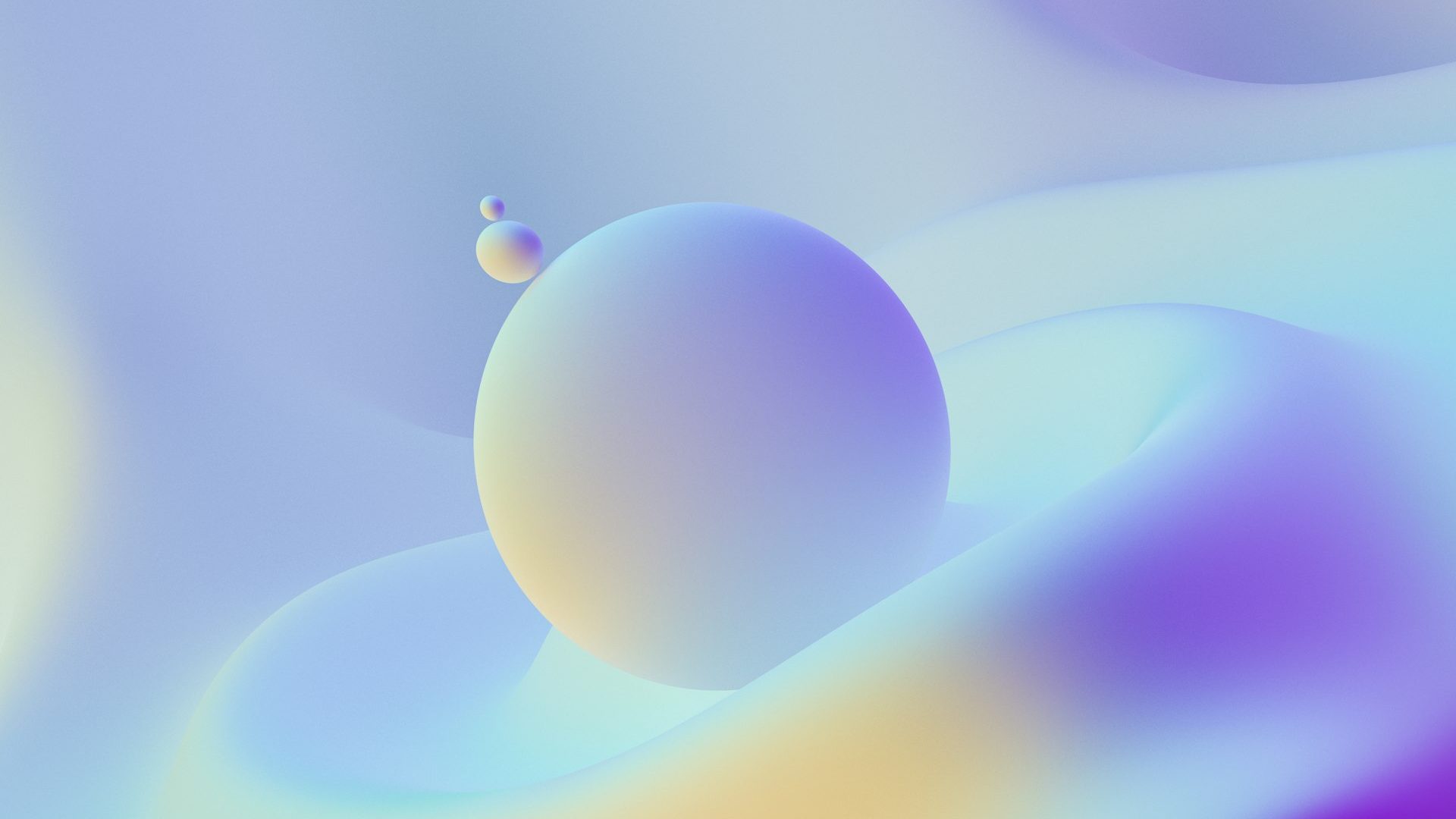 Pastel spheres on a soft gradient background