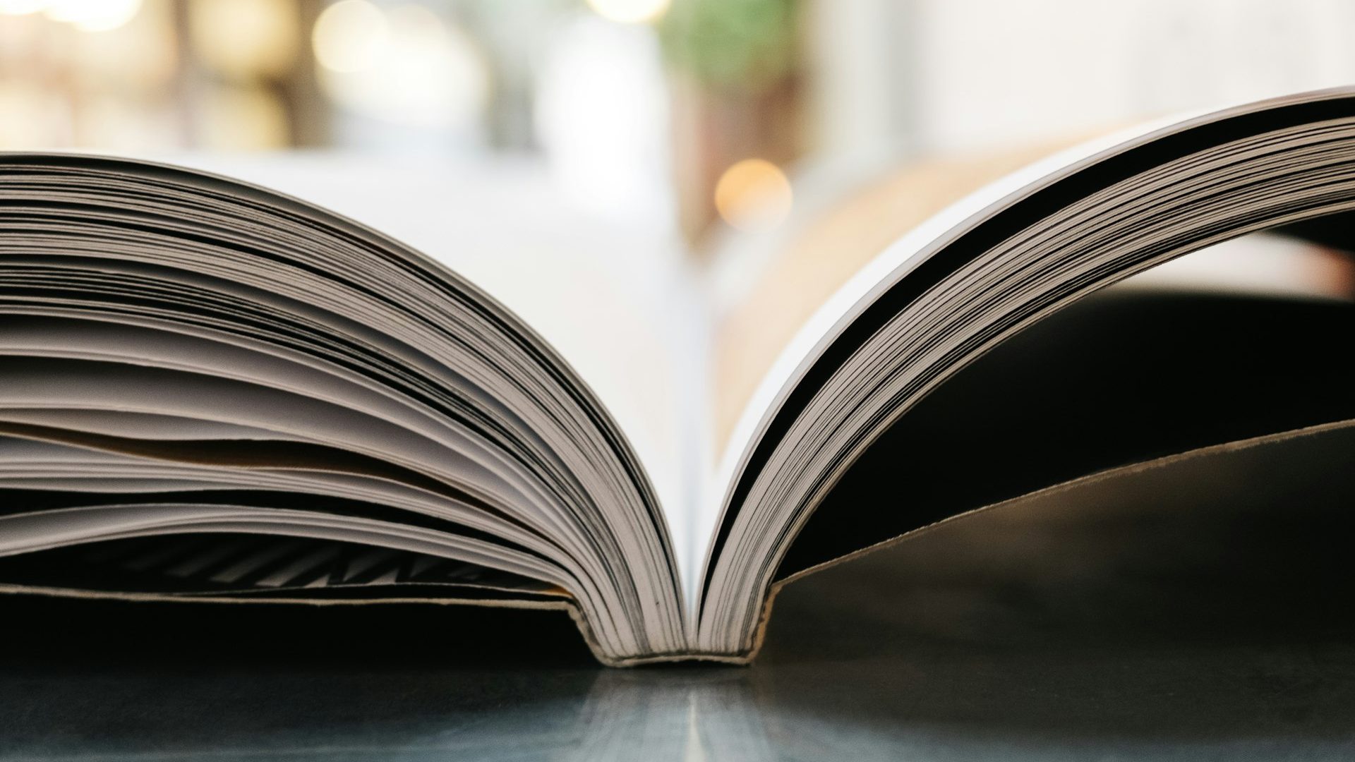 An open book photographed with shallow depth of field