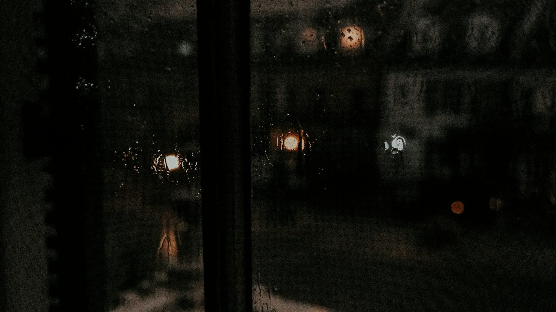 A black framed window looking outside